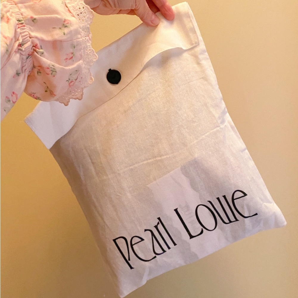 Pearl Lowe - garment bag